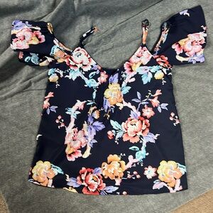 Cold shoulder floral top.